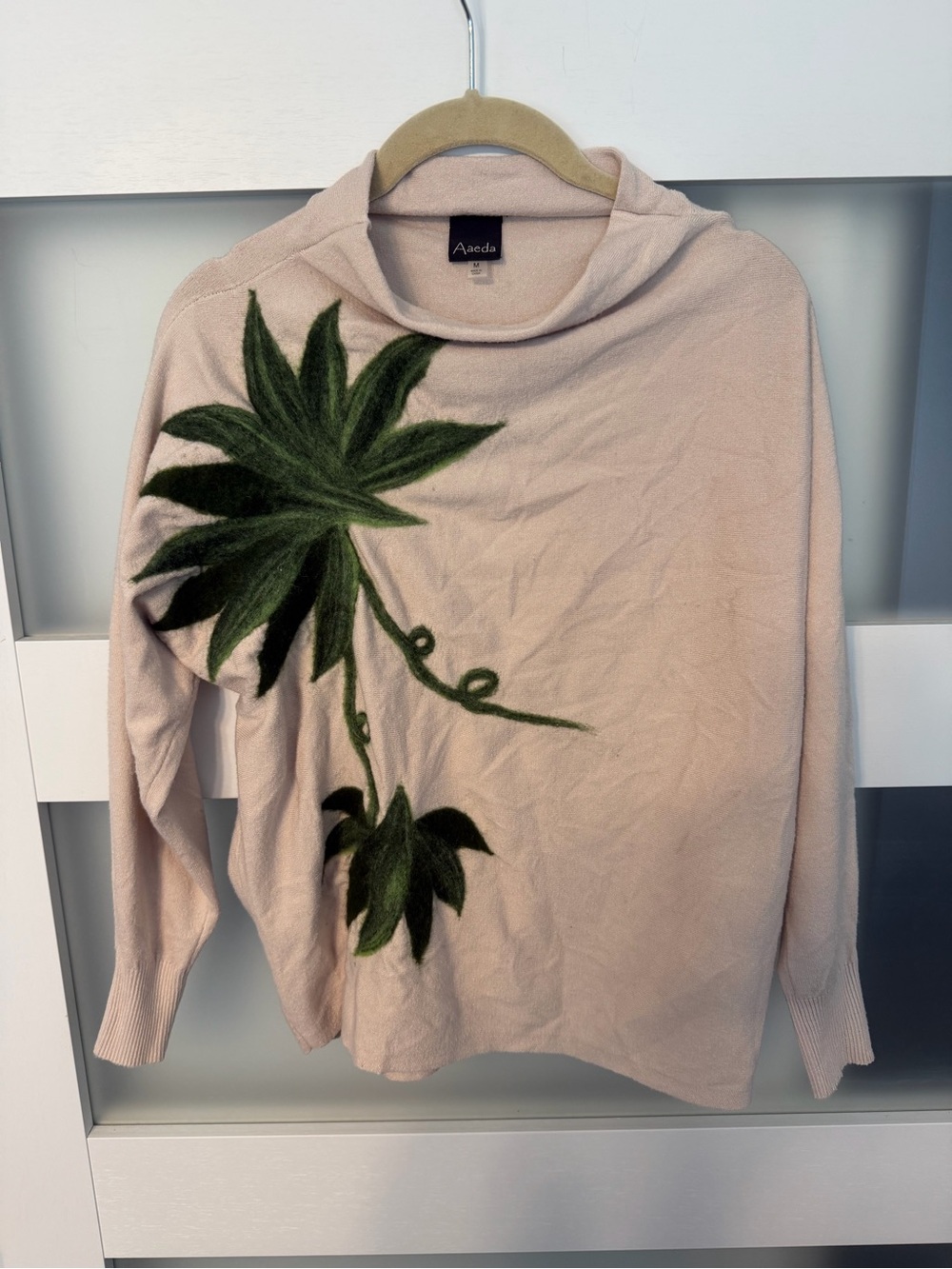 Aaveda Cowl Neck Sweater with Green Leaf Appliqué